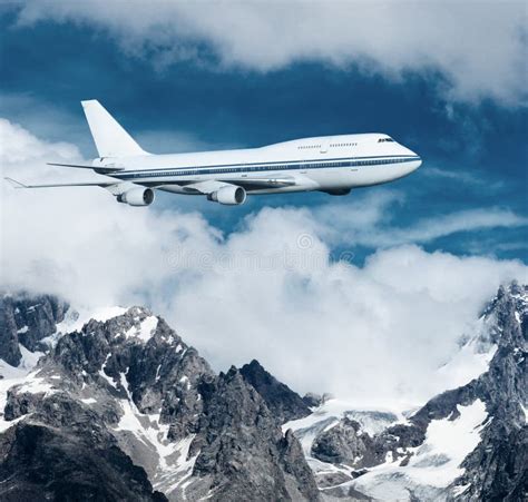 Plane Flying Over the Snow-capped Mountains. Stock Image - Image of airport, peaks: 35320217