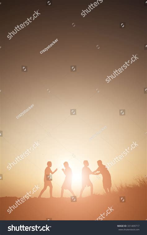 Silhouette Children Playing On Summer Sunset Stock Photo 331409717 ...