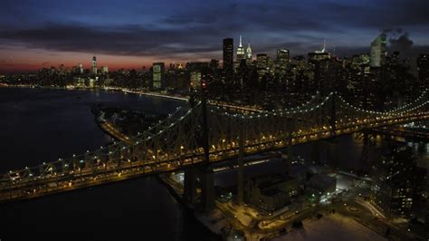 Fly Over Queensboro Bridge toward Midtown Manhattan skyscrapers, New ...