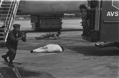 Ninoy Aquino lies on the tarmac of Manila airport after being assassinated on arrival - August ...