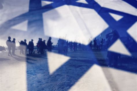 On Israel’s 75th birthday, the flag takes on new meaning as a symbol of protest | The Times of ...