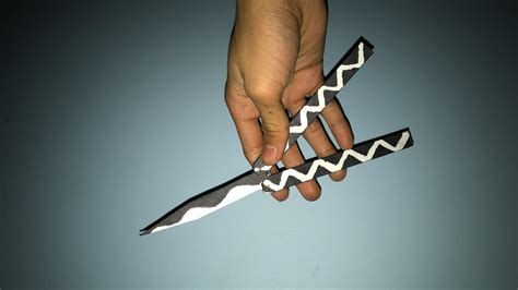 How To Make A Butterfly Knife Out Of Cardboard : Use the cut out paper ...