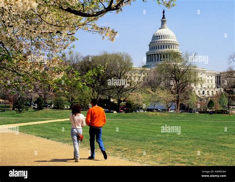 Capitol Building Washington DC Tourists walking on the National Mall ...