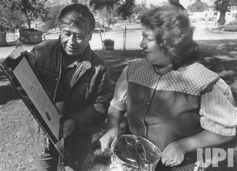 Photo: Cesar Chavez shows wife Helen a plaque from the city of Montreal - ARKCCH19851215014 ...