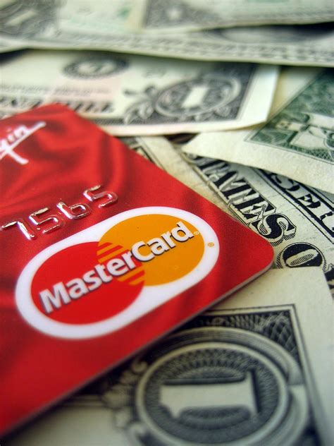Credit Card | A credit card (Mastercard) on a pile of money … | Flickr