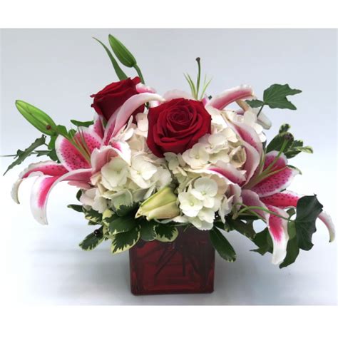 A 4" square red vase holding beautiful white hydrangea, red roses ...