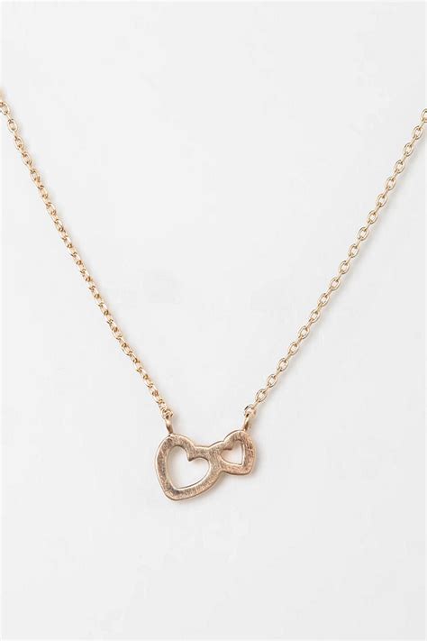 Two Hearts Necklace #UrbanOutfitters | Heart necklace, Necklace, Jewelry