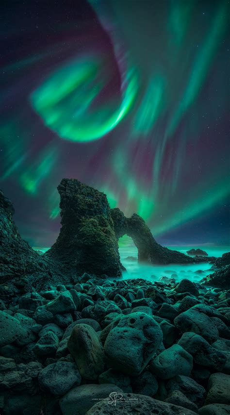 APOD: 2023 January 11 – Spiral Aurora over Iceland