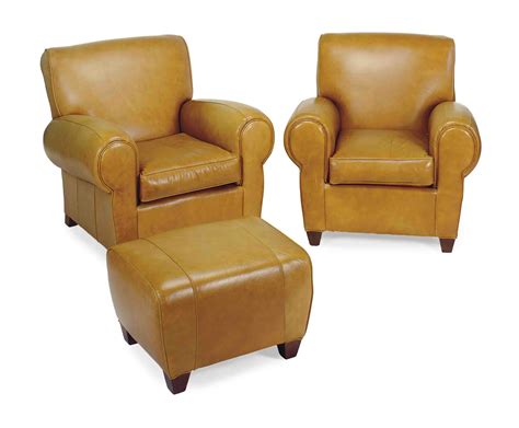 A PAIR OF TAN LEATHER-UPHOLSTERED CLUB CHAIRS AND OTTOMAN, , MODERN ...