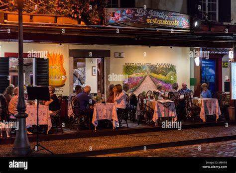 Open air restaurants at night in the Old Town of Funchal, Madeira Stock Photo - Alamy