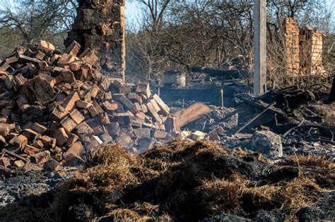 Premium Photo | The consequences of a bomb explosion and a fire in a ...