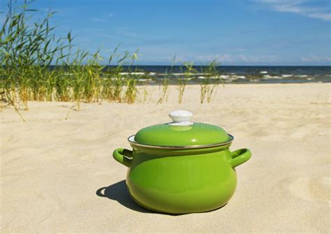 Green pot on a sand. stock image. Image of object, shore - 43770087