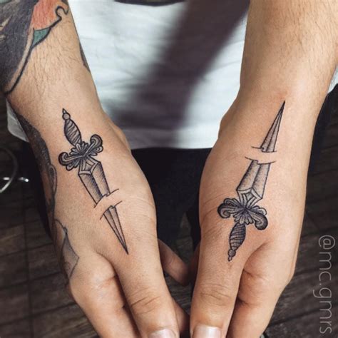 50 Amazing Sword, Dagger, and Knife Tattoo Designs - TattooBlend