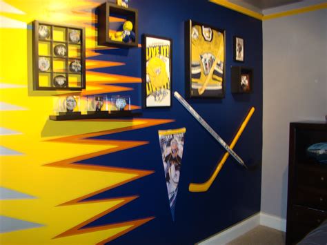 hockey memorabilia wall in kid's room....I like the puck display case Man Cave Inspiration ...