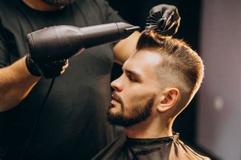 Premium Photo | Professional stylist trimming hair ends | Haircuts for men, Hair cuts, Beard ...