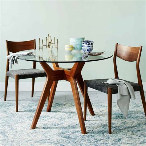 15 Round Glass Dining Room Tables That Add Sophistication To Mealtime