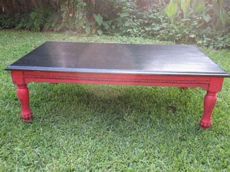 red and black coffee table | InvestEngine