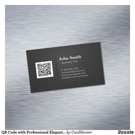 a metal business card with a qr code on the front and back side,