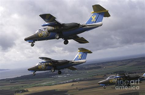 Saab 105 Jet Trainers Of The Swedish Photograph by Daniel Karlsson