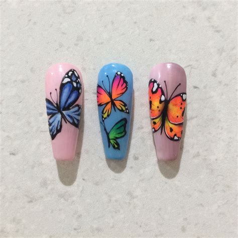 Neon pigments butterfly nails | Butterfly nail art, Butterfly nail designs, Butterfly nail