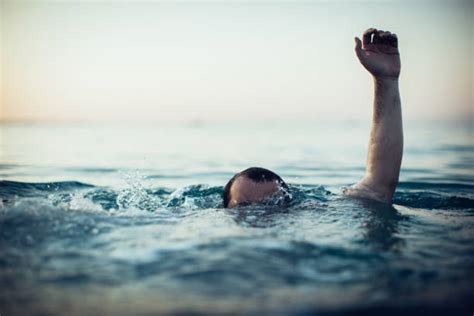 Arm Pain Swimmer Stock Photos, Pictures & Royalty-Free Images - iStock