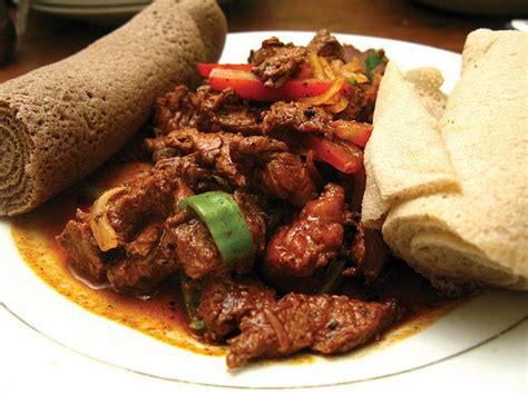 Special tibs (marinated beef) with injera | Ethiopian food, Ethopian ...