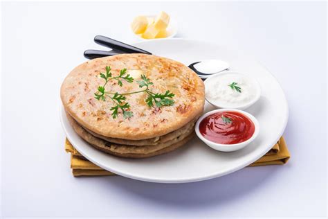 Aloo Gobi Paratha 16584354 Stock Photo at Vecteezy