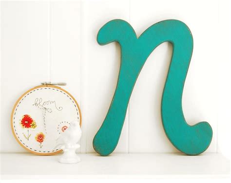 Initial for the wall shelves | Painted wood signs, Hanging wall decor ...