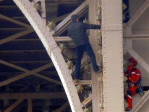 Eiffel Tower evacuated as man tries to scale it - Rediff.com India News