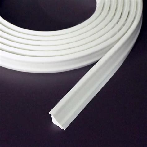 a white cable on a black surface