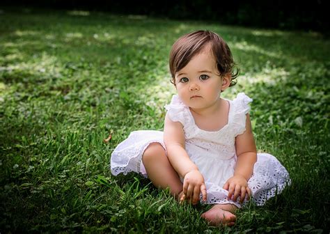 one year old baby girl photos sitting in grass looking at camera One Big Happy Photo | One year ...