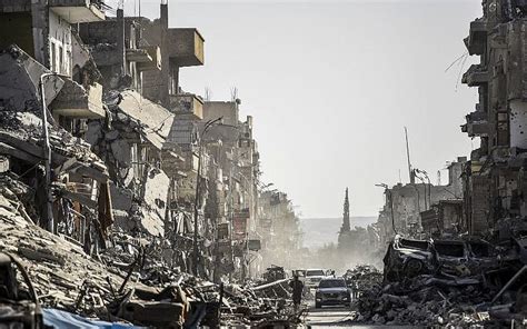 Heartbroken Raqqa residents return to city in ruins | The Times of Israel