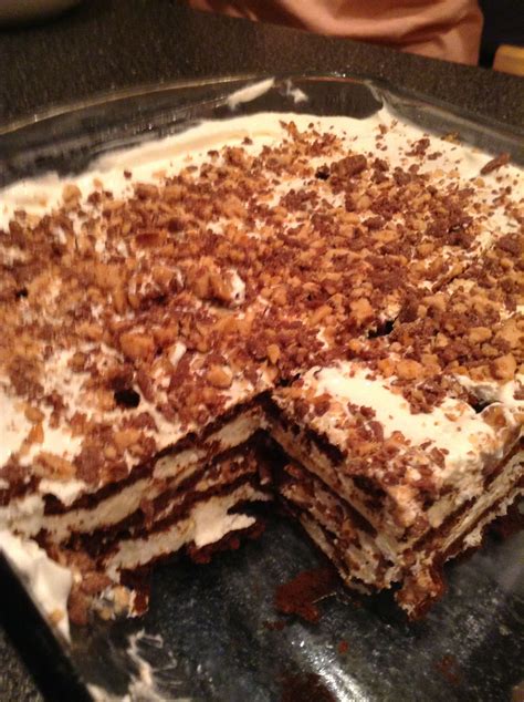 Heath Bar Crunch Ice Cream Cake -A layer of ice cream sandwiches -A layer of whipped cream -A ...