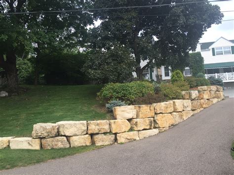 Limestone Boulder Retaining Walls | Twin Cities, MN — Stonewall Inc. Boulder Landscaping