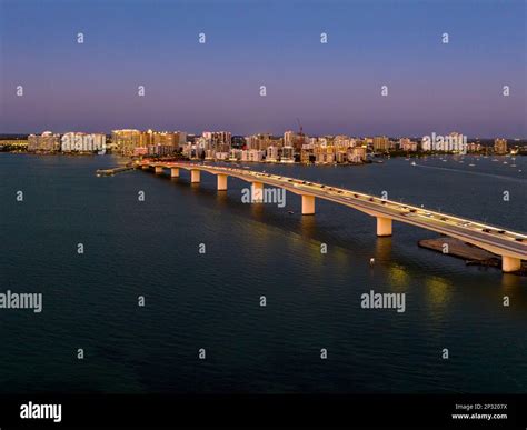 Evening aerial image of the Sarasota, Florida Skyline and Bridge Across ...