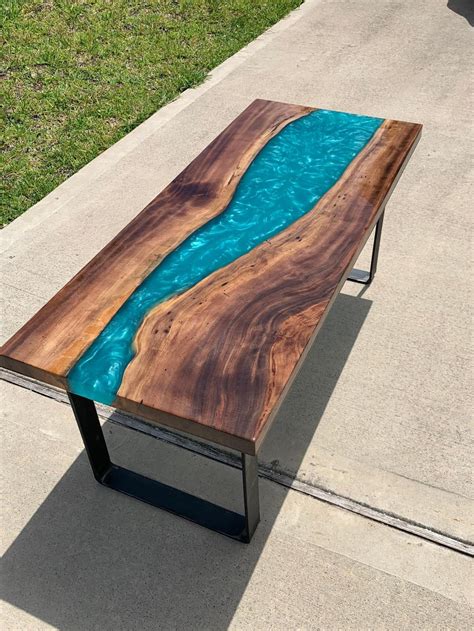This Blue River Epoxy Table Is Made To Look Like a Satellite View Of Earth