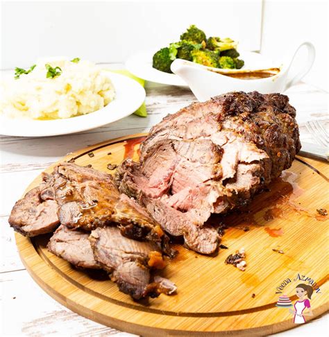 This beef chuck roast is tender and juicy cooked in the oven using a marinade made with garlic ...