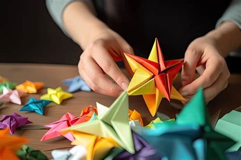 Person, Making Origami Star with Colored Paper for Holiday Decoration ...