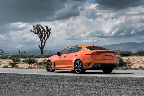 Download Orange Car Car Kia Kia Stinger Vehicle Kia Stinger GTS 4k Ultra HD Wallpaper