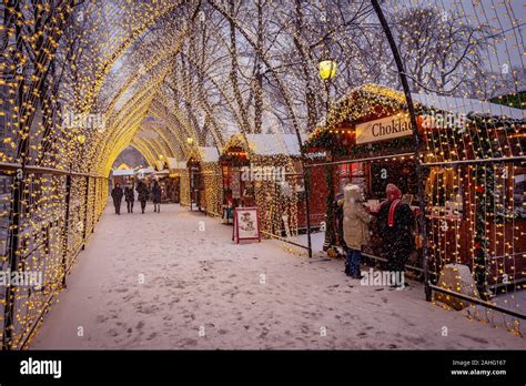 Oslo, Norway - Traditional Christmas market with falling snow Stock ...