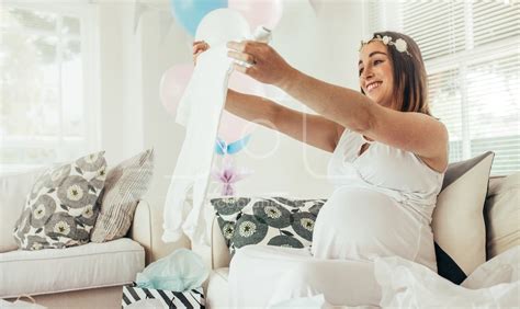 Pregnant woman with presents at baby shower party – Jacob Lund ...