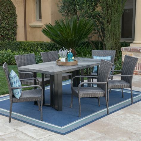 Fabiana Outdoor 7 Piece Wicker Dining Set with Textured Finish Light ...