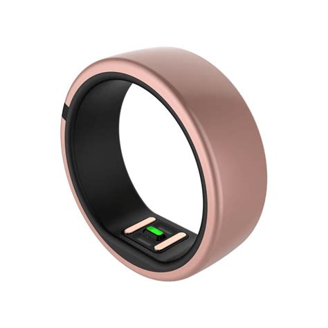 a ring with an electronic charger on it's side and two green buttons in ...