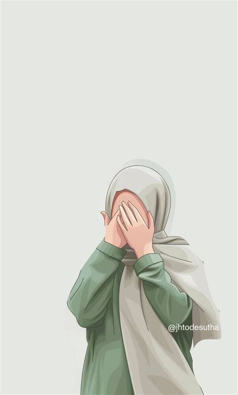 a woman in a hijab covers her face with her hands while standing against a gray background