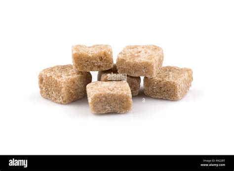 brown sugar cubes isolated Stock Photo - Alamy