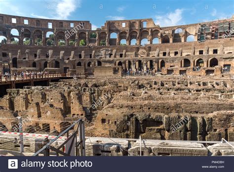 ROME, ITALY - JUNE 24, 2017: Tourists visiting inside part of Colosseum ...