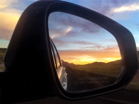 Sunset through the rearview mirror : r/pics