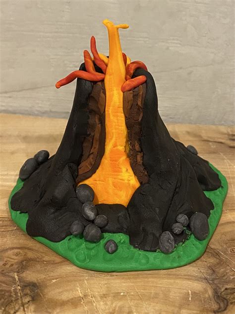 Model of a volcano. Montessori . Kosmisch onderwijs. Cosmic education. Fimo clay Spring Science ...