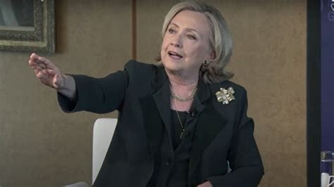 Hillary Clinton confronted by heckler over Biden’s ‘warmongering ...