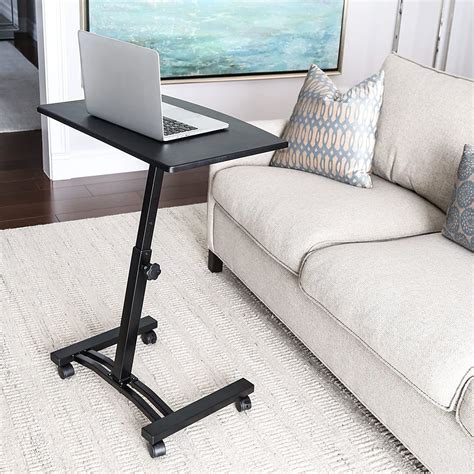 An adjustable rolling desk for anyone whose commitment to couch-desk is ...